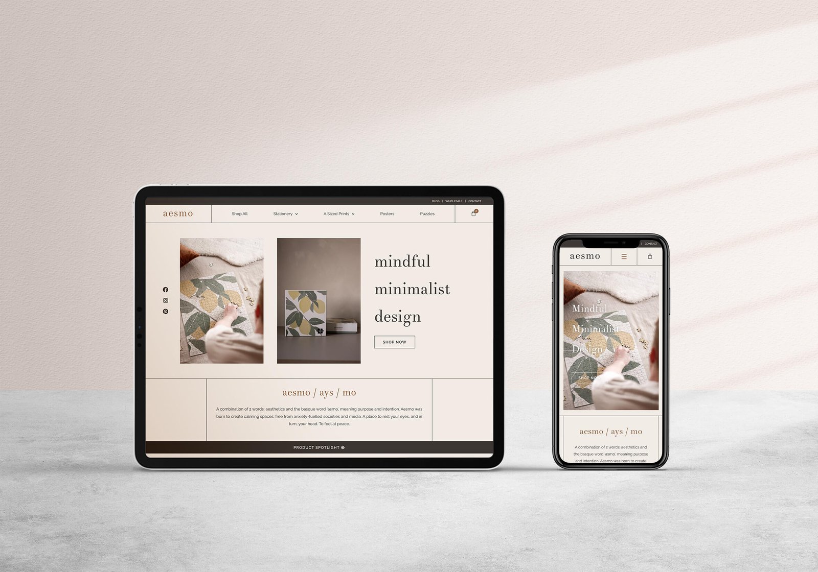 An iPad and an iPhone X with two version of the same responsive website